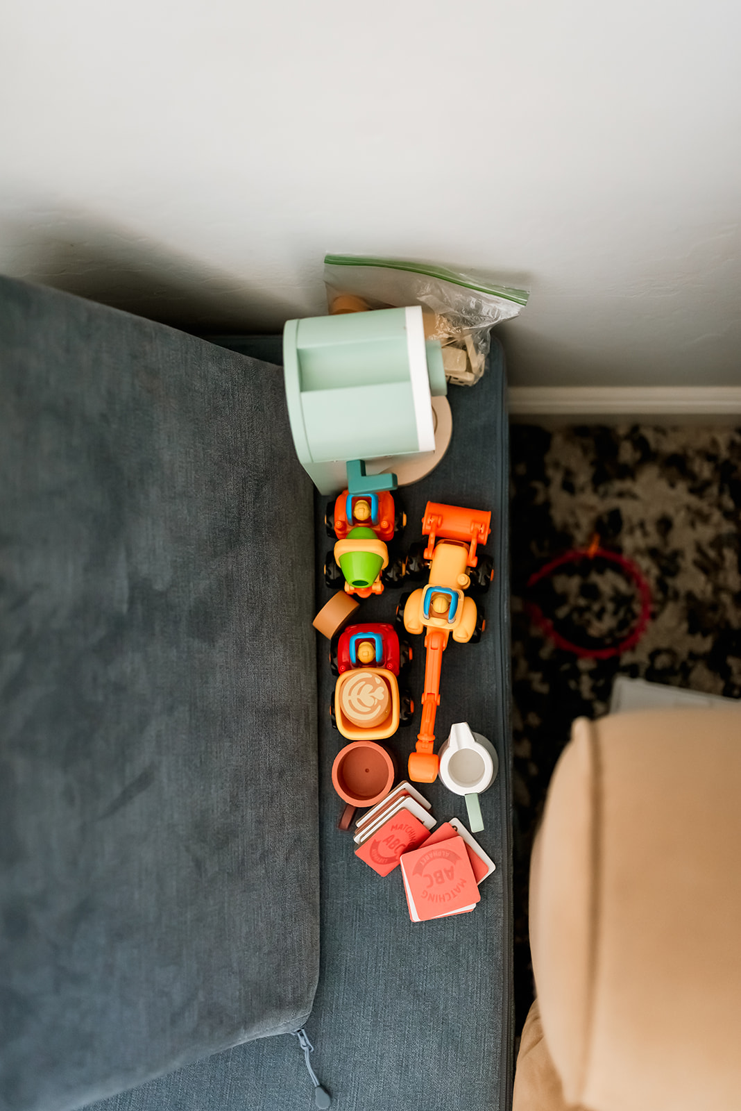 Colorful toys are lined up on the ground